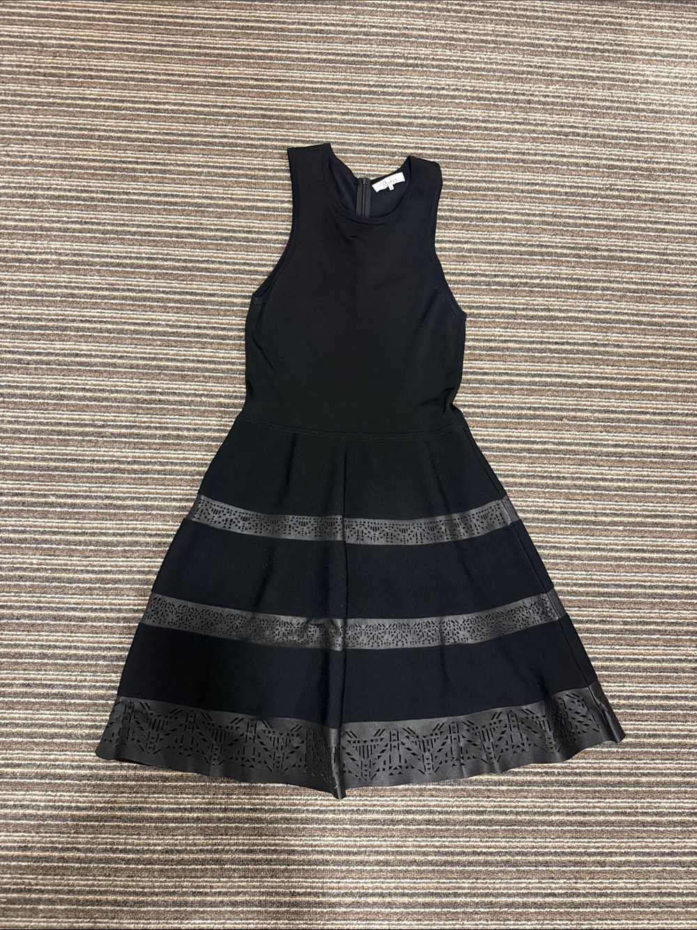 Parker Black Sleeveless Fit-and-Flare Dress with Laser-Cut Bands
